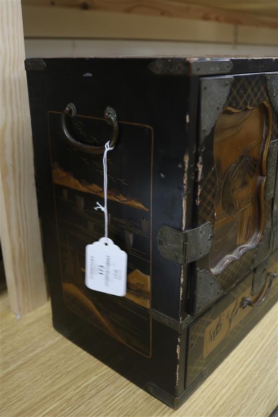 A Japanese lacquer cabinet on stand